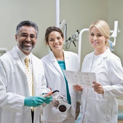 Group of three doctors smiling