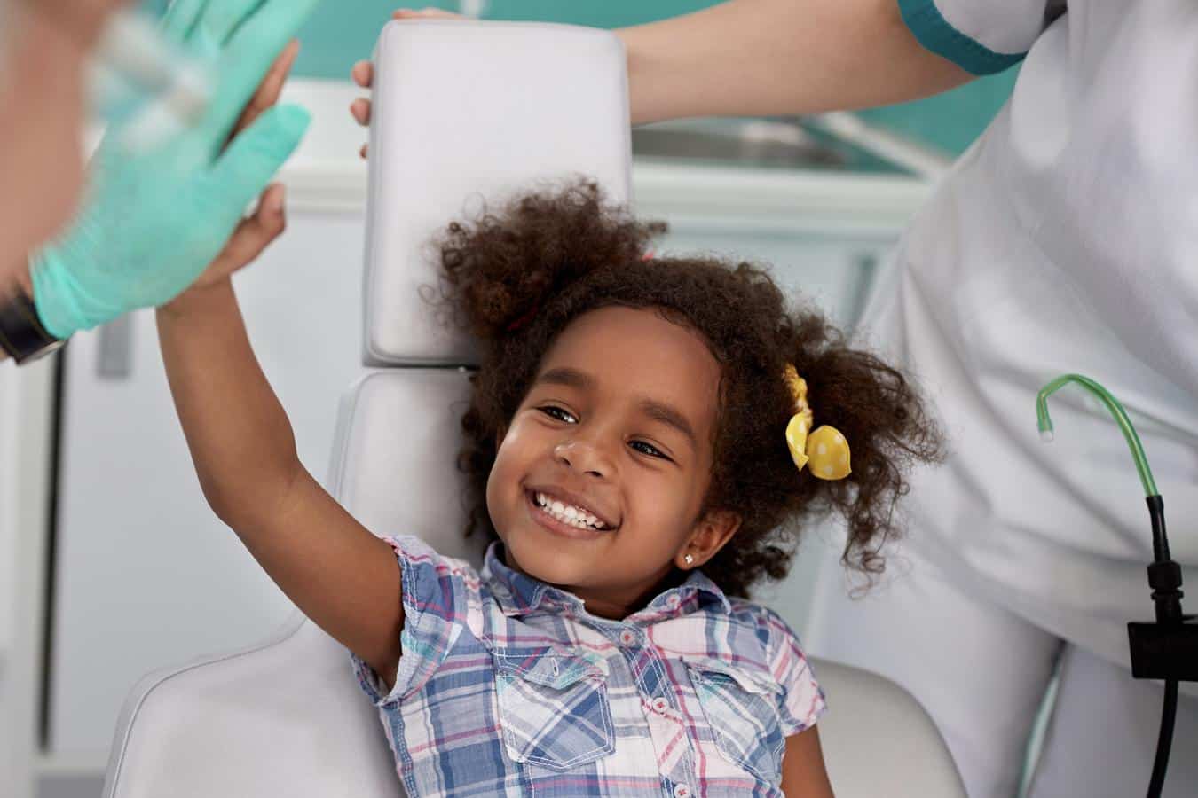 Happy-child-patient-pediatric-dentistry-high-five Join our team